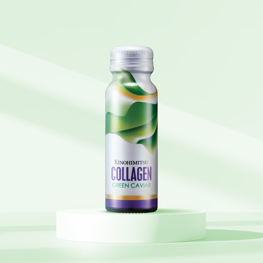 Bottle of Kinohimitsu Collagen Green Caviar displayed on a light green background, emphasizing the product's fresh and natural ingredients. Bottle of Kinohimitsu Collagen Green Caviar on a light green background, featuring a modern design with green and purple accents.
