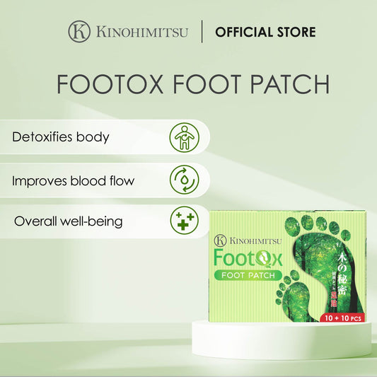 Footox Foot Patch by Kinohimitsu Malaysia features benefits such as body detoxification, improved blood flow, and overall well-being. The image shows the product packaging with a green forest theme and the Kinohimitsu brand logo.