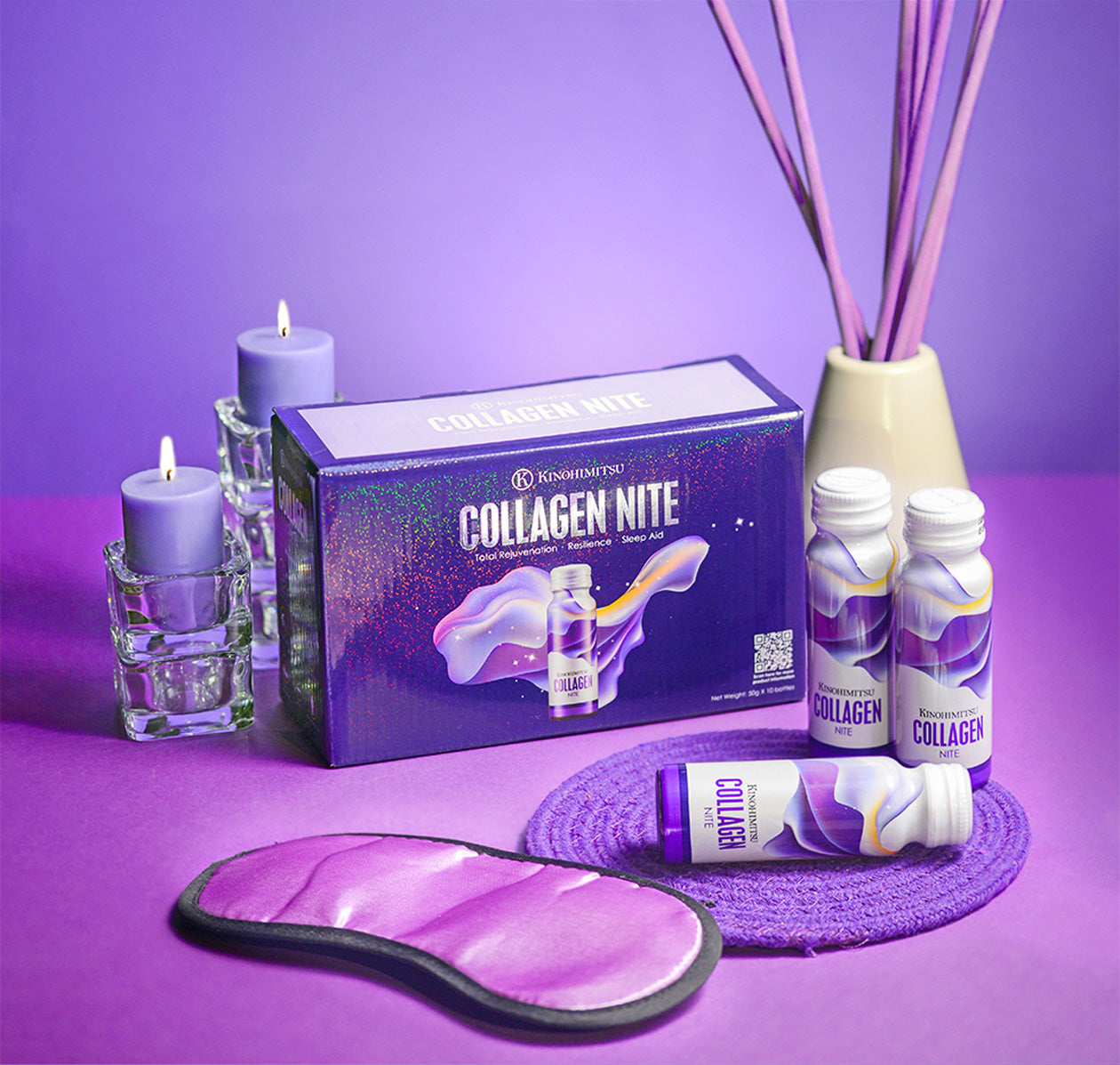 Image of Kinohimitsu Collagen Nite packaging and product, featuring bottles and box with a purple theme, accompanied by a purple sleep mask, lit candles, and decorative sticks, emphasizing relaxation and beauty from Malaysia.