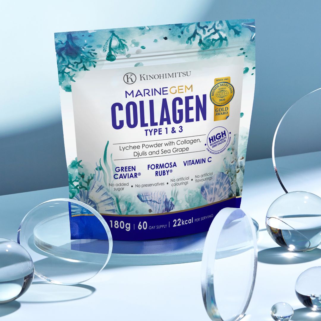 Kinohimitsu Marine Gem Collagen product package with 5000mg label for skin, nail, hair, and joint featuring green caviar, Formosa ruby, and vitamin C. Displayed with glass spheres for an elegant presentation.